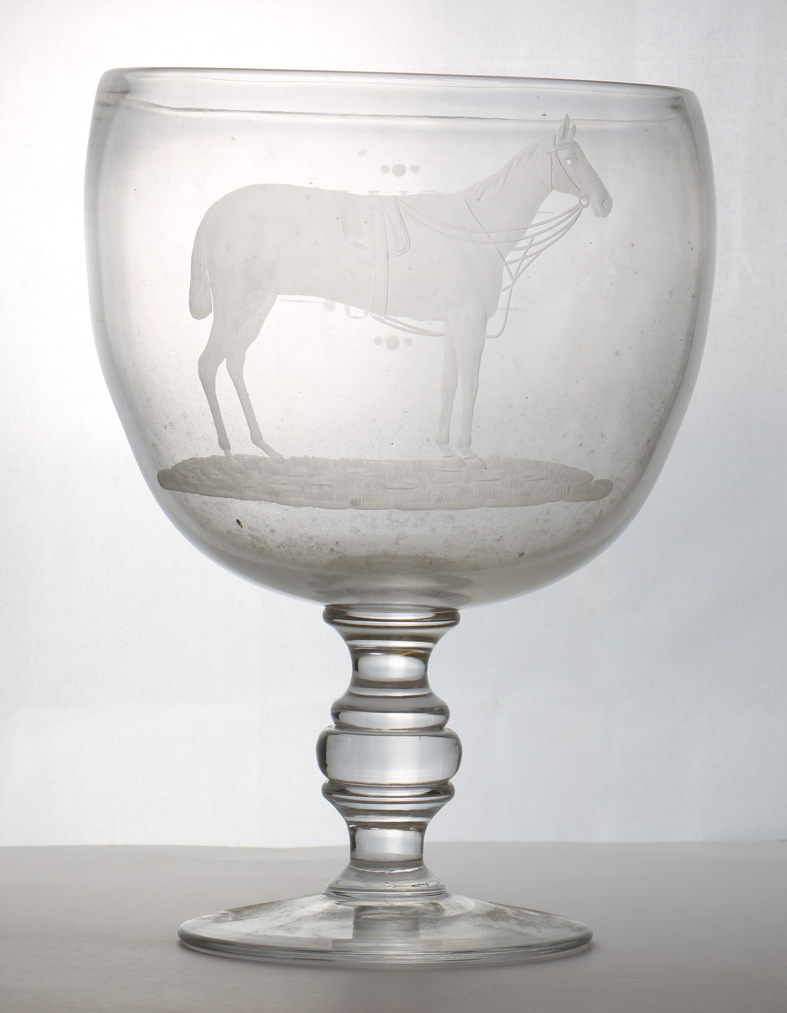 A large Equestrian goblet (£400-600)