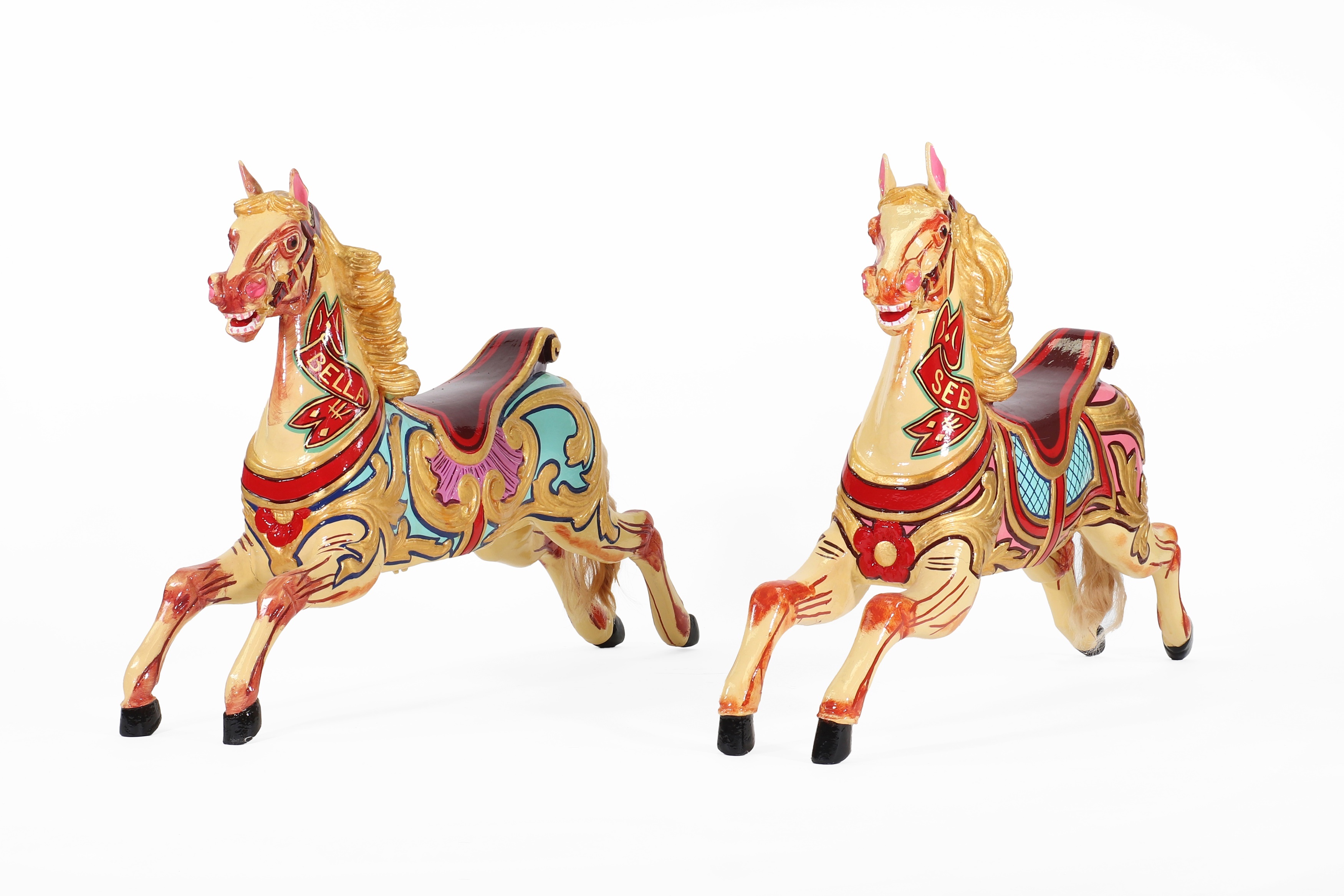 A pair of juvenile 'Dobby' horses by Anderson c.1900, Bristol, each having an alternate saddlecloth design (£3,500-4,500)