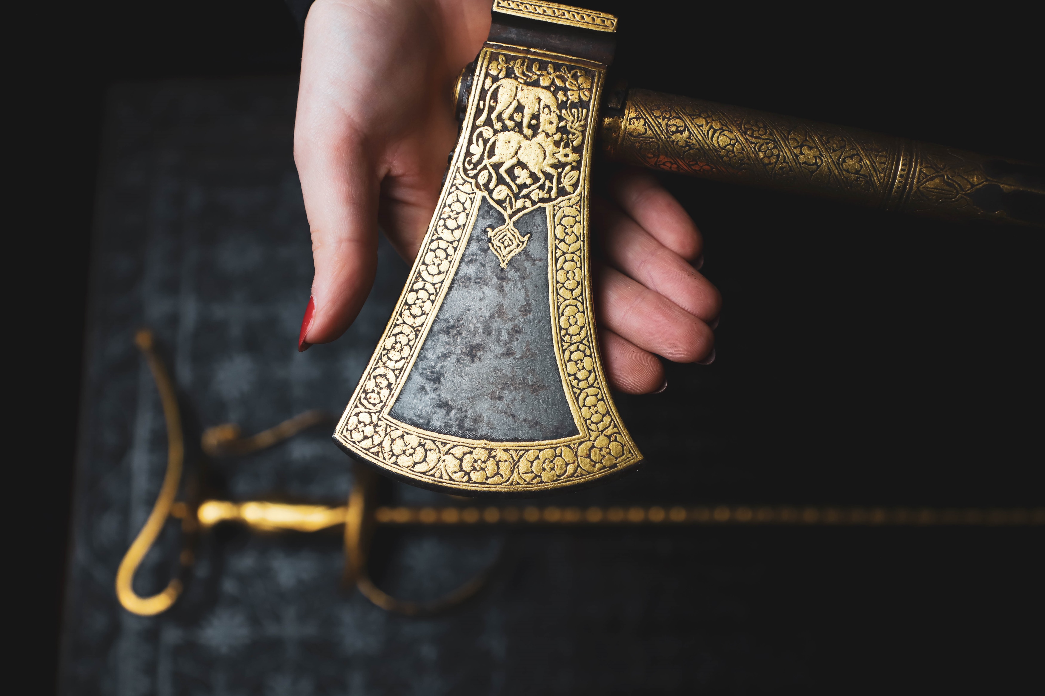 A Mughal Deccan koftgari 'tabarzin' saddle axe (£3,000-5,000)