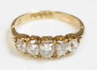 Lot 343 - An Edwardian 18ct gold five stone diamond boat shaped ring