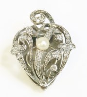 Lot 338 - A pearl and diamond set clip brooch
