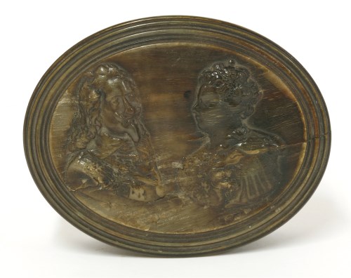 Lot 102 - A pressed horn oval snuff box