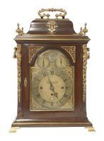 Lot 324 - A George III mahogany and brass mounted bracket clock