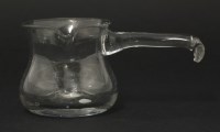 Lot 76 - A rare George II glass Dipping Ladle