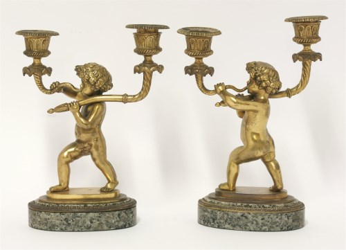 Lot 112 - A pair of gilt bronze candlestands