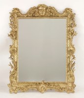 Lot 472 - A carved giltwood wall mirror