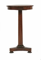 Lot 479 - A Recency rosewood lamp table