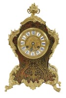 Lot 328 - A boulle mantel clock