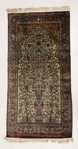 Lot 373 - A silk Kashan carpet