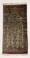 Lot 373 - A silk Kashan carpet