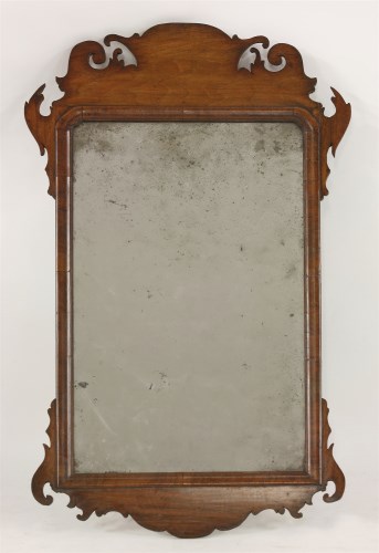 Lot 520 - A George III mahogany fret cut mirror