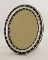 Lot 522 - An Irish oval strut mirror