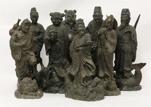 Lot 144 - A set of eight bronze Daoist immortals