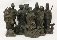 Lot 144 - A set of eight bronze Daoist immortals