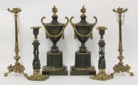 Lot 365 - Two pairs of bronze and gilt bronze candlesticks