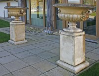 Lot 477 - A pair of reconstituted urns
