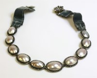 Lot 283 - A Georgian coque de perle and marcasite necklace