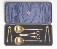 Lot 66 - A pair of Edwardian silver gilt seal top serving spoons