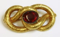 Lot 304 - A Victorian cabochon garnet and gold brooch