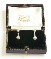 Lot 341 - A pair of diamond and natural pearl drop earrings