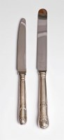 Lot 79 - A set of six George IV silver-handled hourglass pattern table knives