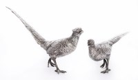 Lot 100 - A pair of silver models of pheasants