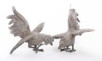Lot 31 - A pair of Mexican metalwares models of cockerels