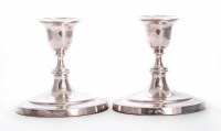 Lot 113 - A pair of Victorian silver dwarf candlesticks