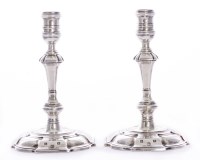 Lot 136 - A pair of silver candlesticks
