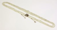 Lot 335 - A two row graduated natural pearl necklace