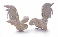 Lot 153 - A pair of silver models of cockerels