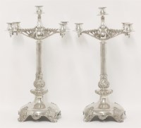 Lot 7 - A pair of silver-plated four branch candelabra