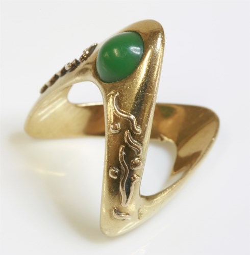 Lot 77 - A Continental gold and turquoise set wishbone ring