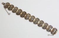 Lot 46 - A Spanish silver and gold shell link bracelet