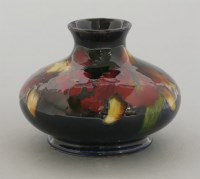 Lot 122 - A Moorcroft flambé 'Orchid' squat vase