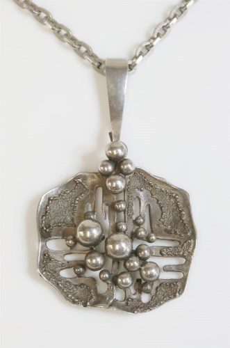 Lot 47 - A silver modernist pendant and chain
