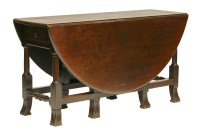 Lot 102 - A George l mahogany oval gateleg table