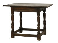 Lot 107 - An oak centre table