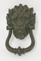 Lot 154 - A heavy brass door knocker