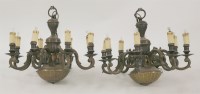 Lot 369 - A pair of Dutch-style brass eight-branch ceiling lights