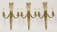 Lot 370 - Three gilt bronze twin branch wall lights