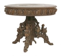 Lot 455 - An extraordinary Black Forest carved walnut centre table