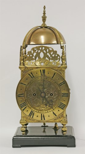 Lot 264 - A brass 'lantern' clock
