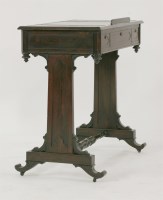 Lot 390 - A small rosewood writing table