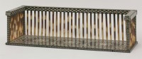 Lot 49 - An Indian inlaid ebony and porcupine quill bookrack