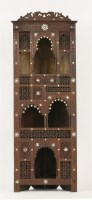 Lot 1384 - An early 20th century Moorish standing corner cupboard