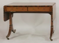 Lot 1442 - An early 19th century satin birch and coromandel crossbanded sofa table