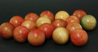 Lot 1172 - A collection of seventeen Victorian stained ivory snooker balls