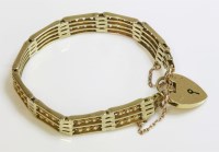 Lot 1048 - An Edwardian gold three row gate bracelet