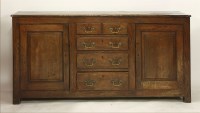 Lot 1457 - A George III oak dresser base